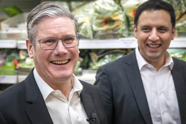 Labour Party leader Sir Keir Starmer (left) and Anas Sarwar, leader of the Scottish Labour Party, during a visit to the Stalks & Stem store, a small business in Shawlands, Glasgow. Picture: PA