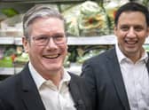 Labour Party leader Sir Keir Starmer (left) and Anas Sarwar, leader of the Scottish Labour Party, during a visit to the Stalks & Stem store, a small business in Shawlands, Glasgow. Picture: PA