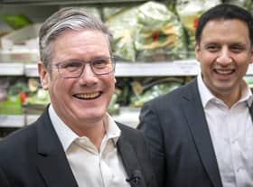 Labour Party leader Sir Keir Starmer (left) and Anas Sarwar, leader of the Scottish Labour Party, during a visit to the Stalks & Stem store, a small business in Shawlands, Glasgow. Picture: PA