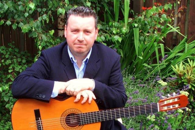 Alan McMillan had a lifelong passion for music, playing classical guitar at weddings and other events