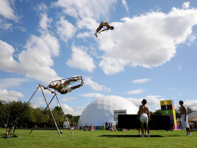 An acrobat from La Meute flies over the Circus Hub, the Fringe venue on the Meadows. Picture: Jane Barlow