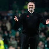 Celtic manager Ange Postecoglou takes the acclaim of the Celtic fans after the 2-1 win over Ross County.