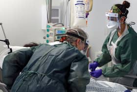 Being on the frontline of the fight against Covid, nurses and other health staff can suffer from exhaustion, post-traumatic stress and 'moral injuries' (Picture: Steve Parsons/PA)