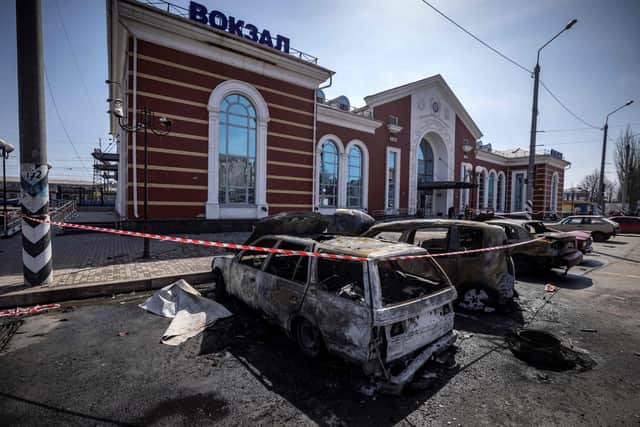 Burnt out cars are pictured outside a train station in Kramatorsk, eastern Ukraine, that was being used for civilian evacuations, after it was hit by a rocket attack