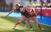Scotland's Coreen Grant gets past Wales' Jenny Hesketh during the Six Nations opener in Cardiff.