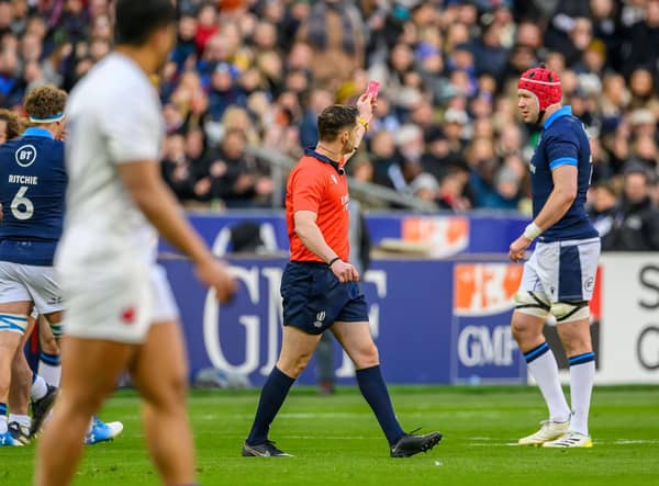 Referee Nika Amashukeli shows a red card to Grant Gilchrist during the France v Scotland game.  (Photo by Malcolm Mackenzie/ProSports/Shutterstock)
