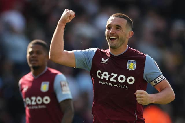 Aston Villa and Scotland midfielder John McGinn celebrates after the win over Tottenham on Saturday. (Photo by ADRIAN DENNIS/AFP via Getty Images)