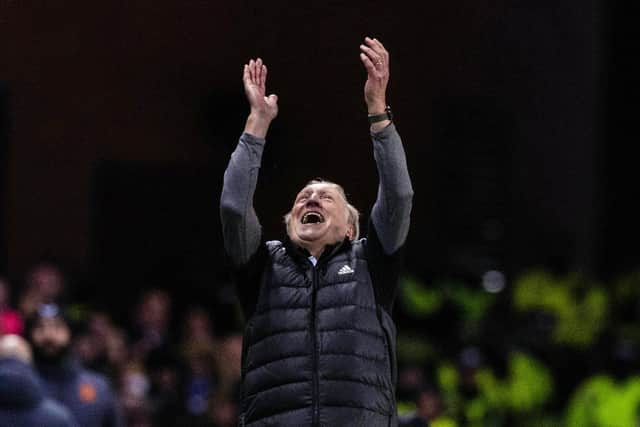 Aberdeen manager Neil Warnock looks to the heavens during the 2-1 defeat by Rangers at Ibrox.