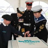 There's no official inauguration without a cake - and Princess Anne even helped slice it.