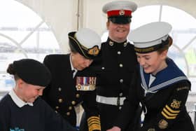 There's no official inauguration without a cake - and Princess Anne even helped slice it.