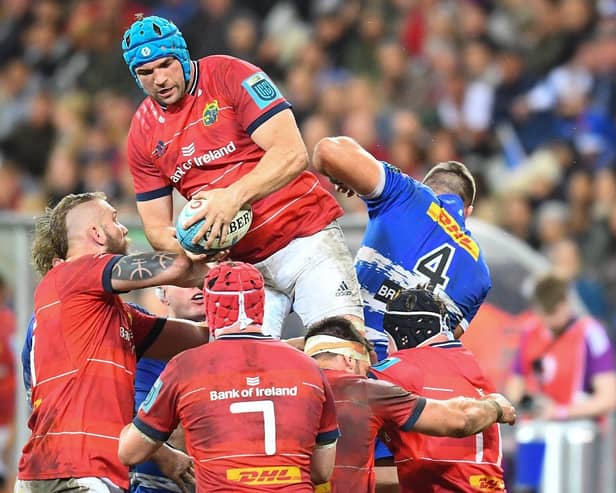 Munster's lock Tadhg Beirne (top L) handles the ball in the line-out during the URC final against Stormers.