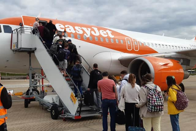 Passengers boarding a delayed Gatwick to Glasgow flight on Monday (Picture: The Scotsman)