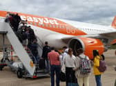 Passengers boarding a delayed Gatwick to Glasgow flight on Monday (Picture: The Scotsman)