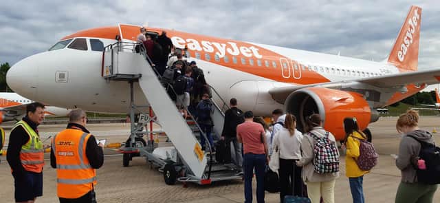 Passengers boarding a delayed Gatwick to Glasgow flight on Monday (Picture: The Scotsman)