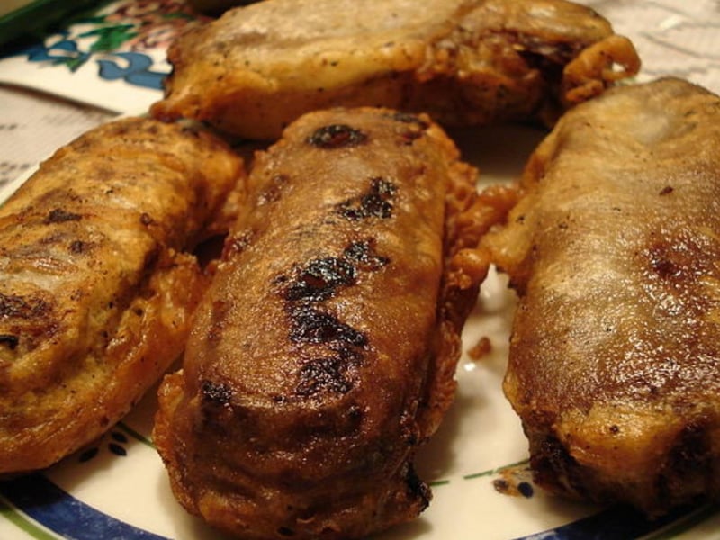 The story goes that 'battered mars bars' were invented in a little chip shop in Stonehaven almost three decades ago, and since caught the media's attention becoming an instant Scottish classic. In reality, however, they're not so commonly encountered in any average chippy. Meanwhile, haggis dates back to 1430 (at least) in Scotland and is considered a very traditional dish, but is usually only consumed nationwide during celebrations like Burns Night on 25 January.