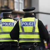 Manhunt after sexual assault and robbery on public footpath 