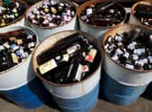 A small fortune in empties. Glasses and cans will come with a 20p refundable deposit from August next year (Picture: Kazuhiro Nogi/AFP via Getty Images)