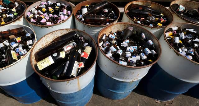 A small fortune in empties. Glasses and cans will come with a 20p refundable deposit from August next year (Picture: Kazuhiro Nogi/AFP via Getty Images)