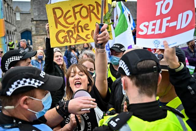 Trans Rights activists hold a counter demonstration next to a women's rights demo last year in Edinburgh as the reforms to the Gender Recognition Act in Scotland gathered pace. PIC: Jeff J Mitchell/Getty Images.