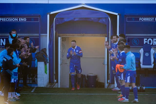 Queen of the South skipper Stephen Dobbie is given a guard of honour by his teammates and backroom staff before the 2-0 defeat to Dundee  (Photo by Craig Foy / SNS Group)