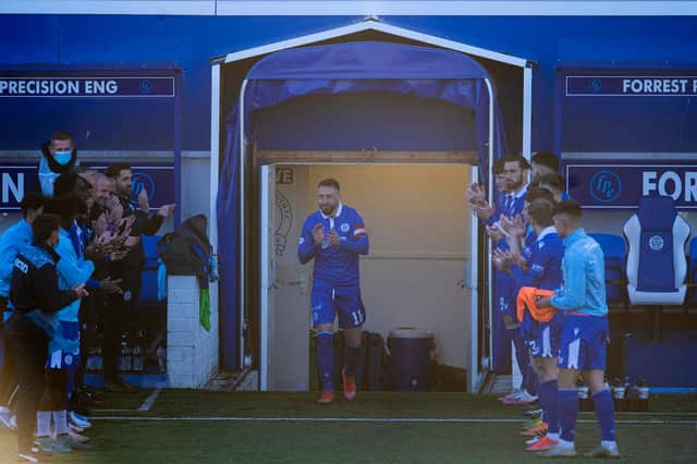 Queen of the South skipper Stephen Dobbie is given a guard of honour by his teammates and backroom staff before the 2-0 defeat to Dundee (Photo by Craig Foy / SNS Group)