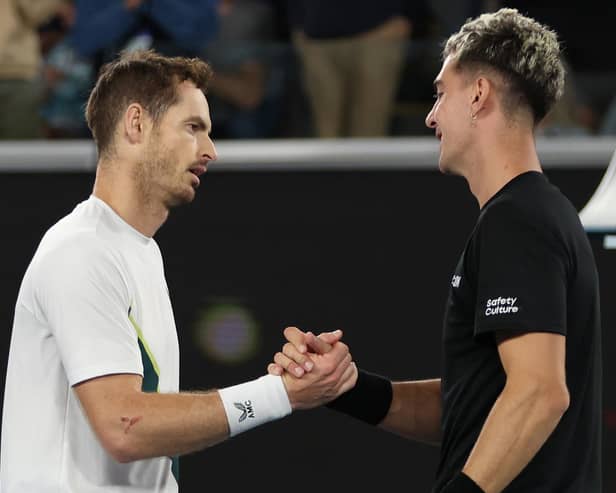 Andy Murray shakes hands with Thanasi Kokkinakis after their epic five-set encounter in the Australian Open second round. (Photo by Clive Brunskill/Getty Images)