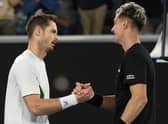 Andy Murray shakes hands with Thanasi Kokkinakis after their epic five-set encounter in the Australian Open second round. (Photo by Clive Brunskill/Getty Images)