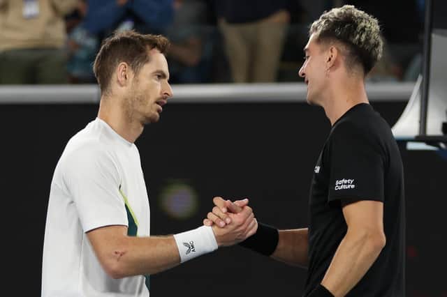 Andy Murray shakes hands with Thanasi Kokkinakis after their epic five-set encounter in the Australian Open second round. (Photo by Clive Brunskill/Getty Images)