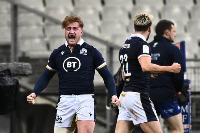 Stuart Hogg roars with delight after Duhan van der Merwe's late try gave Scotland a first win in Paris since 1999.