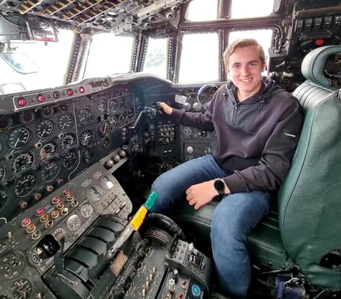 George Walker Jnr in the cockpit of his late Grandad's Royal Airforce transport aircraft.