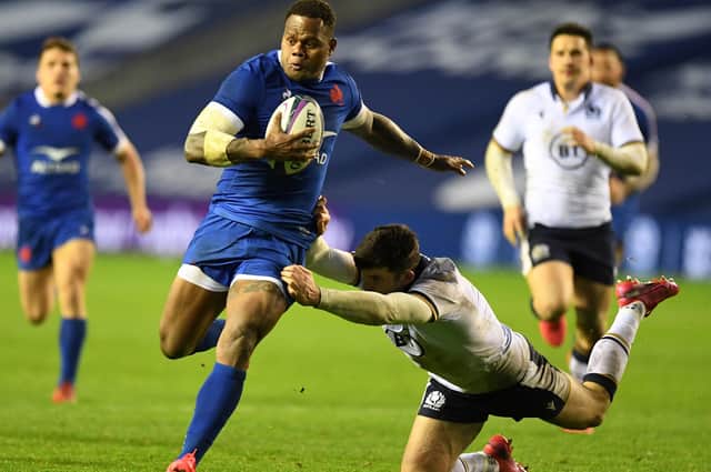 France centre Virimi Vakatawa runs in to score the opening try against Scotland at Murrayfield.