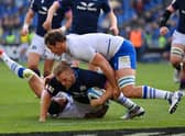 Chris Harris of Scotland touches down for the third try during the Guinness Six Nations Rugby match between Italy and Scotland at Stadio Olimpico on March 12, 2022 in Rome, Italy. (Photo by Justin Setterfield/Getty Images)