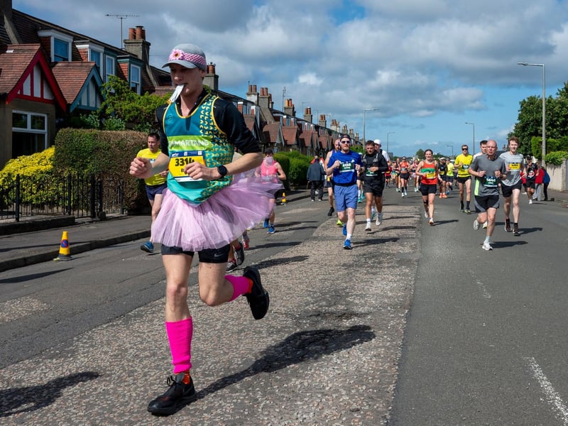 Edinburgh Marathon runners at the four mile mark in the Craigentinny area of the City