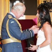 Eve Muirhead chats to the Prince of Wales as she is made an MBE  and an OBE
Pic: Jonathan Brady