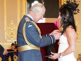 Eve Muirhead chats to the Prince of Wales as she is made an MBE  and an OBE
Pic: Jonathan Brady