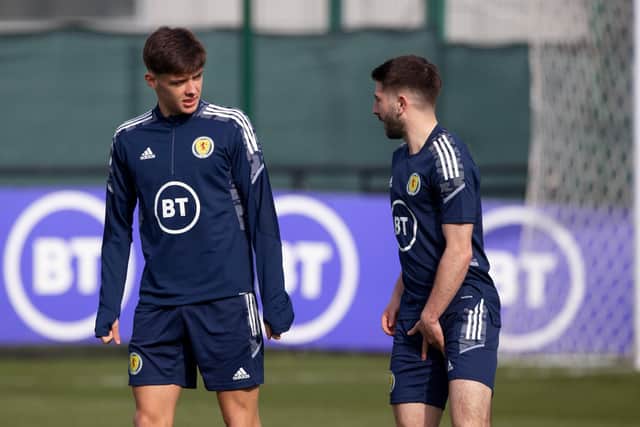 Scotland's Aaron Hickey, left, should edge out Greg Taylor , right, to earn a first cap in the absence of captain Andy Robertson for the Polish friendly. (Photo by Craig Williamson / SNS Group)