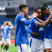 Jermain Defoe celebrates with Ianis Hagi and Joe Aribo after putting Rangers 2-0 up against Livingston at Ibrox on Sunday. (Photo by Rob Casey / SNS Group)