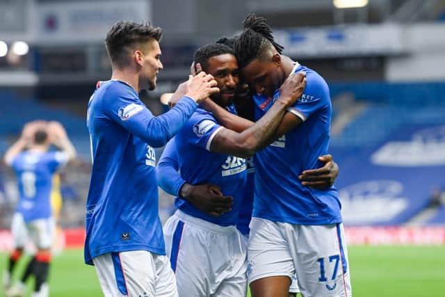 Jermain Defoe celebrates with Ianis Hagi and Joe Aribo after putting Rangers 2-0 up against Livingston at Ibrox on Sunday. (Photo by Rob Casey / SNS Group)