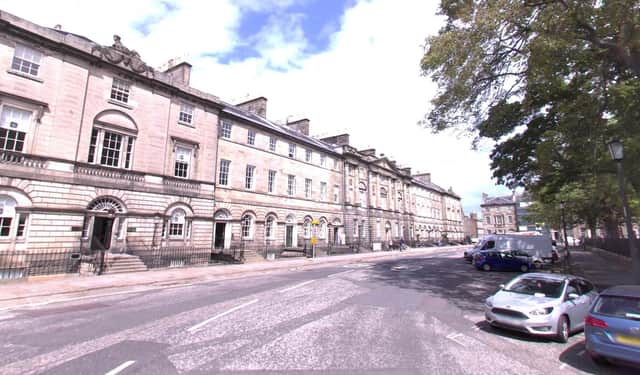 The banner was hung on railings at Charlotte Square yesterday (Pic: Google Maps)