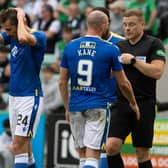 Callum Booth can't hide his disappointment at the decision to award Hibs a penalty against St Johnstone.