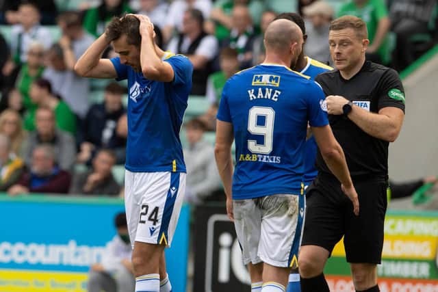 Callum Booth can't hide his disappointment at the decision to award Hibs a penalty against St Johnstone.