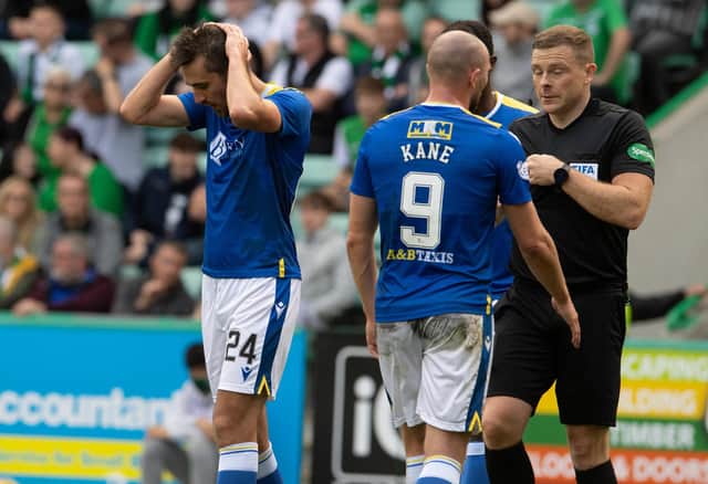 Callum Booth can't hide his disappointment at the decision to award Hibs a penalty against St Johnstone.