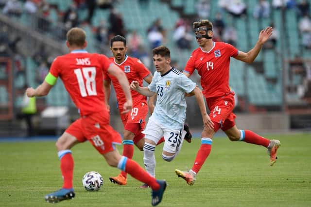 Scotland midfielder Billy Gilmour (C) fights for the ball with Luxembourger forward Maurice Deville (R) during the friendly football match between Luxembourg and Scotland at the Josy Barthel Stadium in Luxembourg on June 6, 2021, in preparation for the UEFA 2020 European Championships. (Photo by JOHN THYS/AFP via Getty Images)