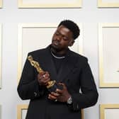 Daniel Kaluuya poses backstage with the Oscar for Best Actor in a Supporting Role, for Judas And The Black Messiah, at the 93rd Academy Awards ceremony.