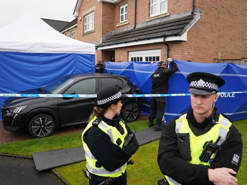 Officers from Police Scotland at the home of former chief executive of the Scottish National Party (SNP) Peter Murrell, in Uddingston, Glasgow, after he was arrested in connection with the ongoing investigation into the funding and finances of the party.