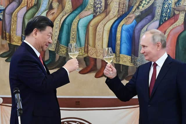 China's Xin Jinping told Vladimir Putin last month that, together, they were changing the world in a way not seen for 100 years (Picture: Pavel Byrkin/Sputnik/AFP via Getty Images)