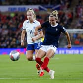 England's Lauren Hemp (left) and Scotland's Martha Thomas battle for the ball during Friday's match in Sunderland.