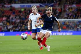 England's Lauren Hemp (left) and Scotland's Martha Thomas battle for the ball during Friday's match in Sunderland.