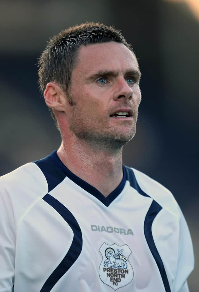 Sporting one of his many different haircuts, this from his Preston days