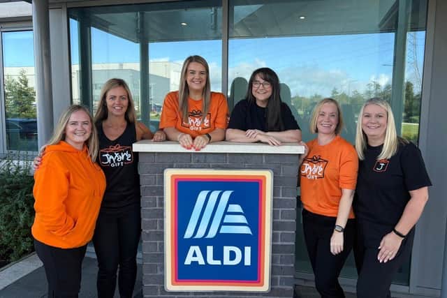 Ashley McKenzie (central left) with Aldi colleagues and teammates ahead of Edinburgh Kiltwalk this weekend